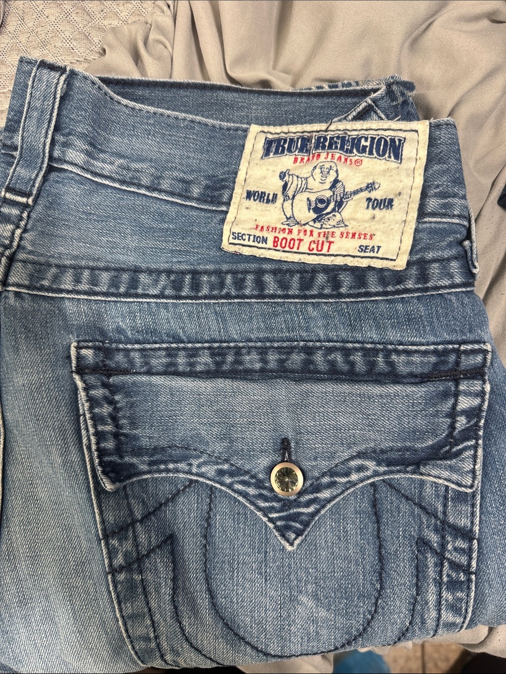True Religion Light Blue Men’s Boot Cut Jeans with Signature Back Pocket